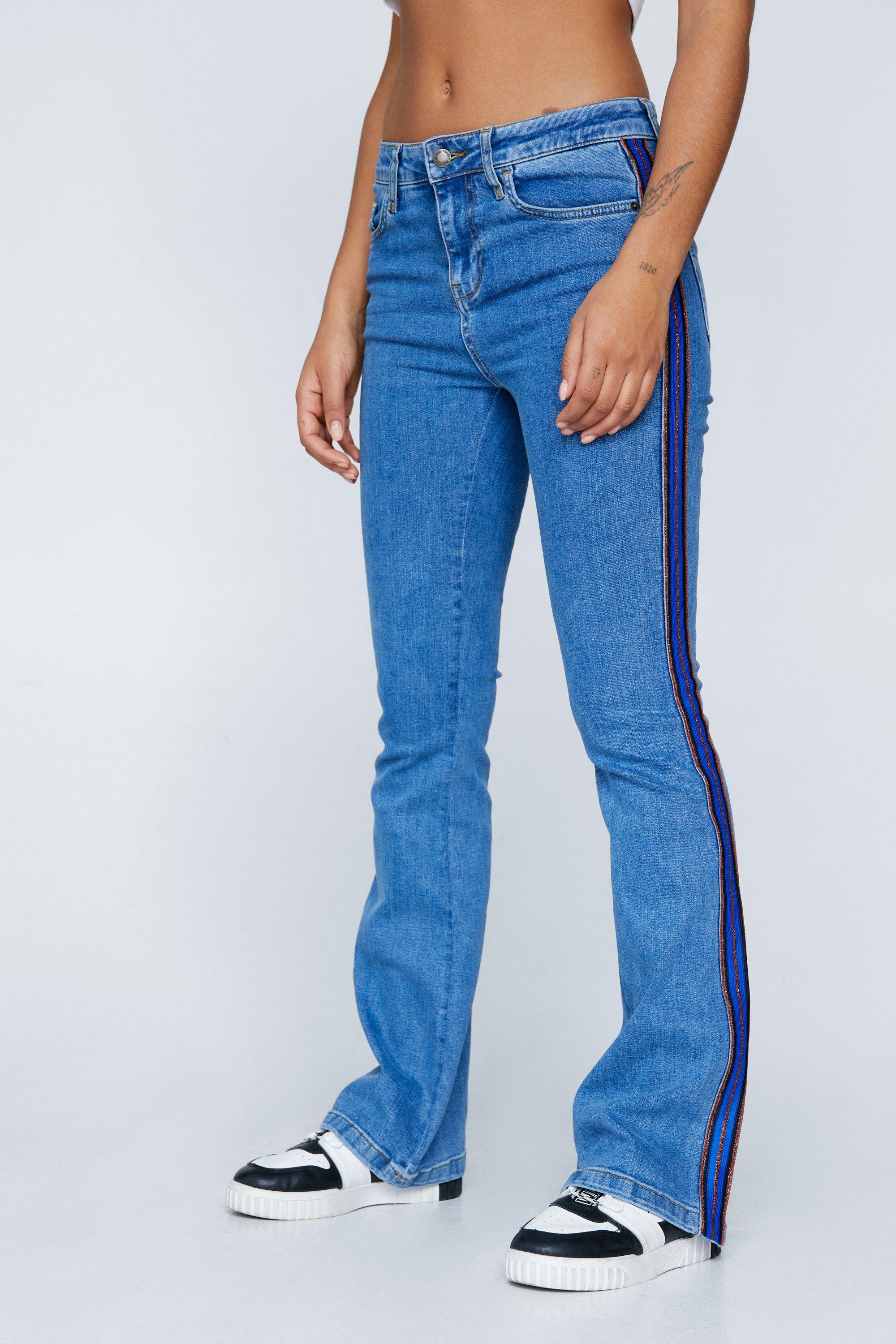 Jeans with stripes on sale on the side